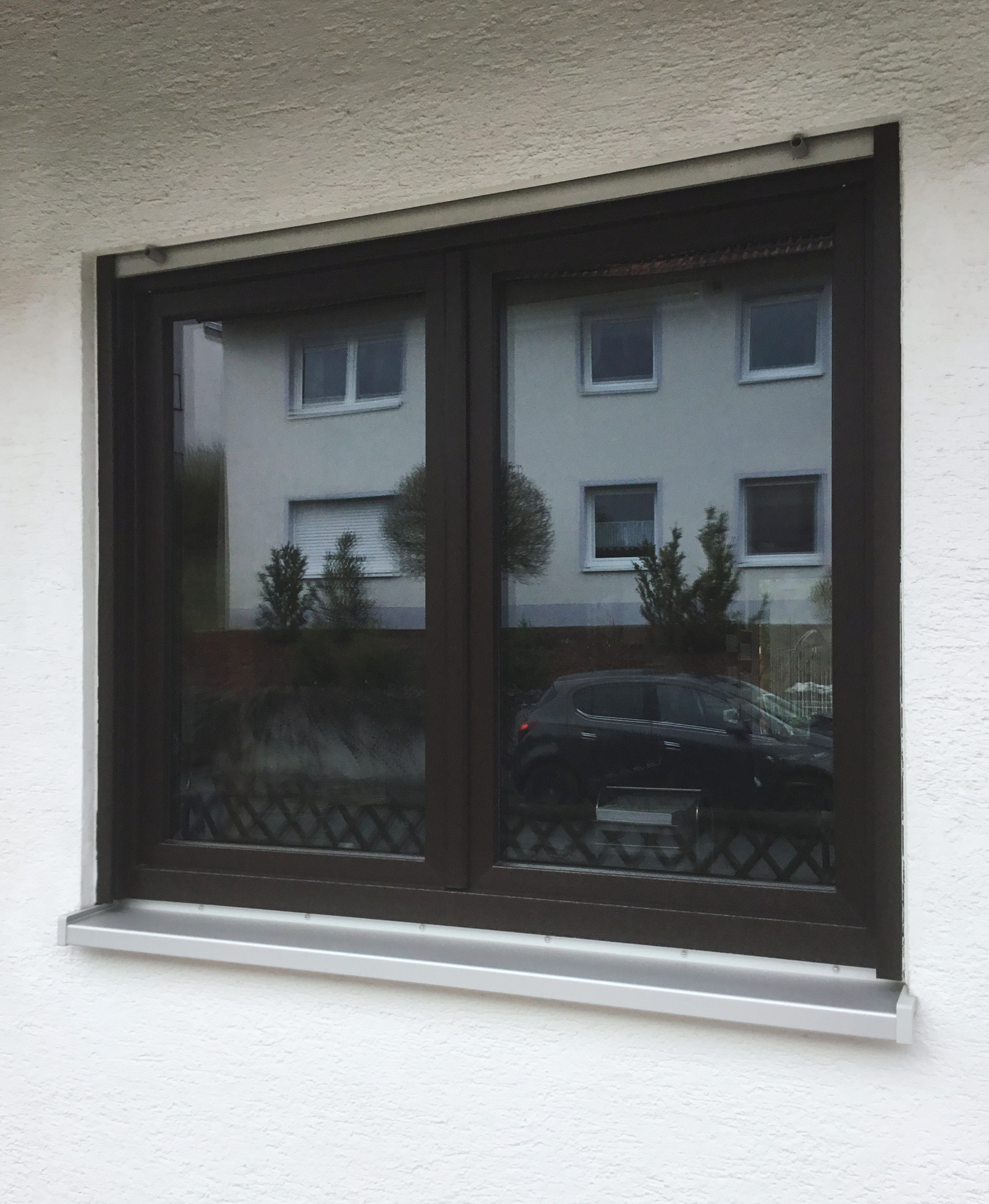 Kunststofffenster Mooreiche foltert